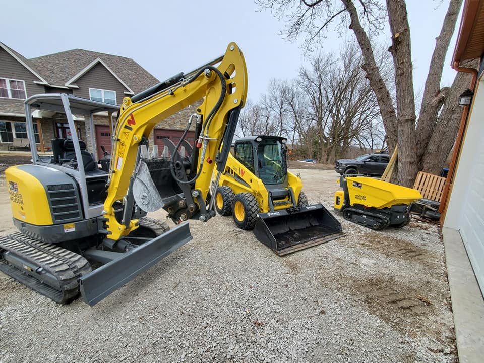 Group of 3 Wacker Nueson equipment outside